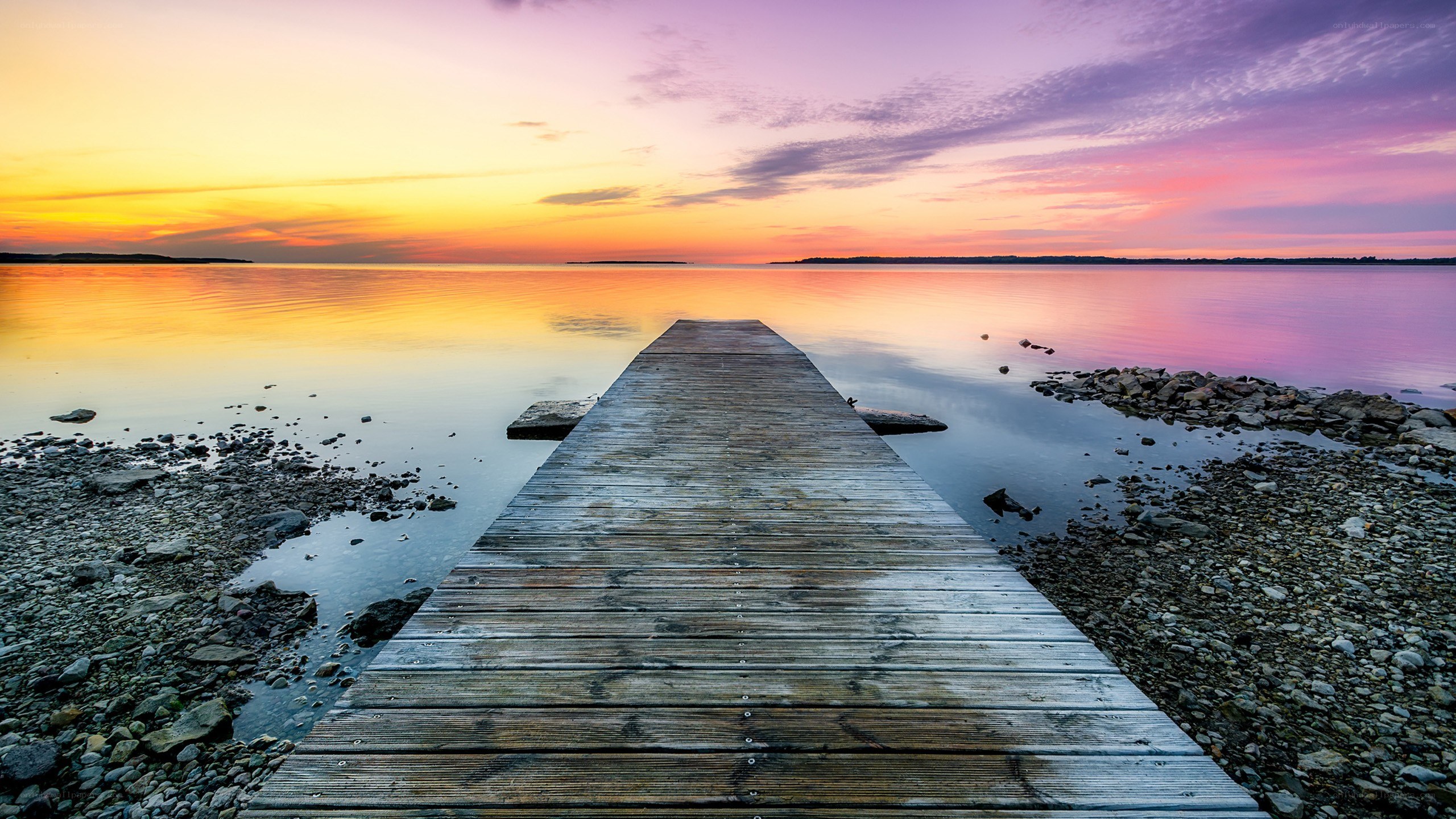 Wooden dock at sunset