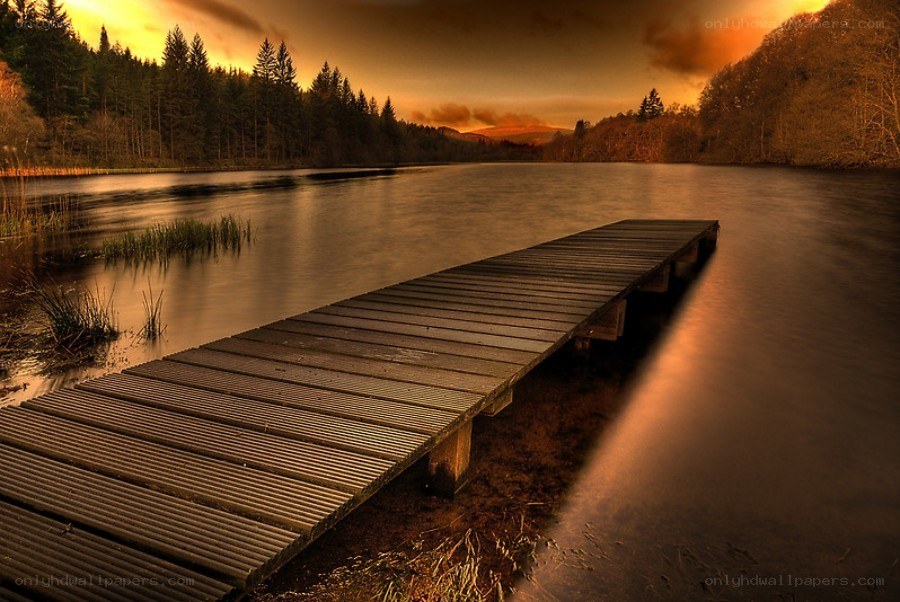 Wooden dock at sunset