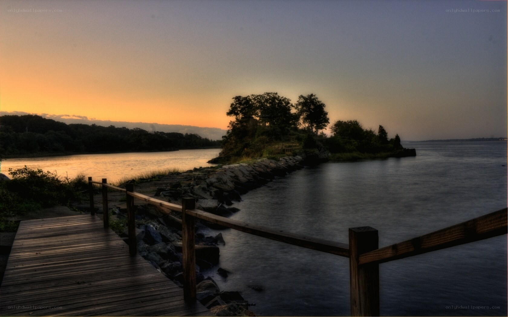 Wooden dock at sunset