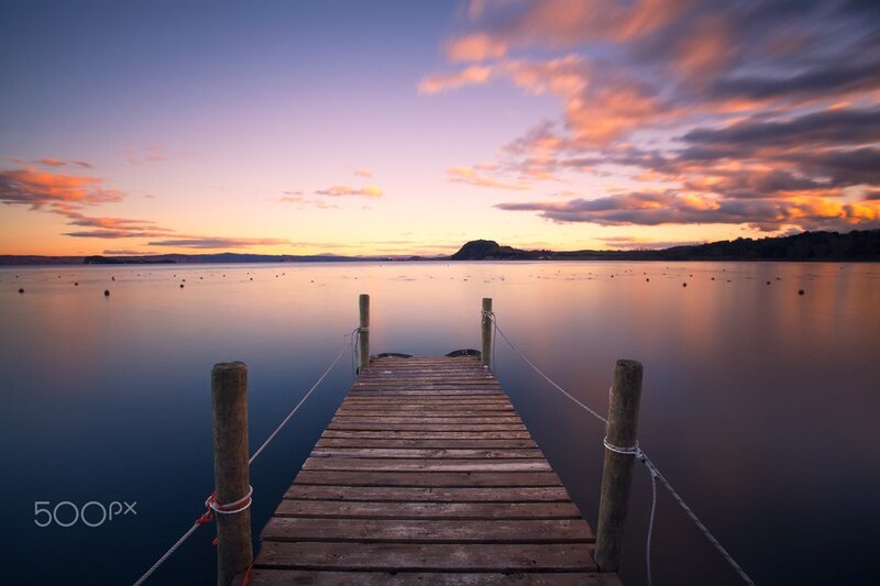 Wooden Dock at Sunset — Blue, Serene, Photograph, Water, Sky, Clouds