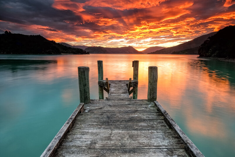 Wooden Dock at Sunset — Orange, Dramatic, Photograph, Lake, Mountains