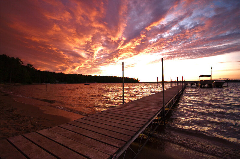 Wooden Dock at Sunset — Orange, Dramatic