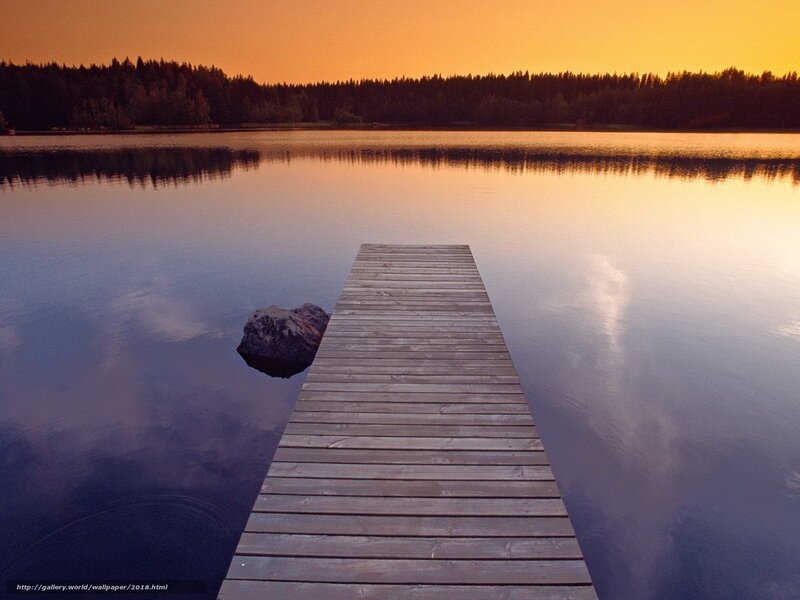Wooden dock at sunset