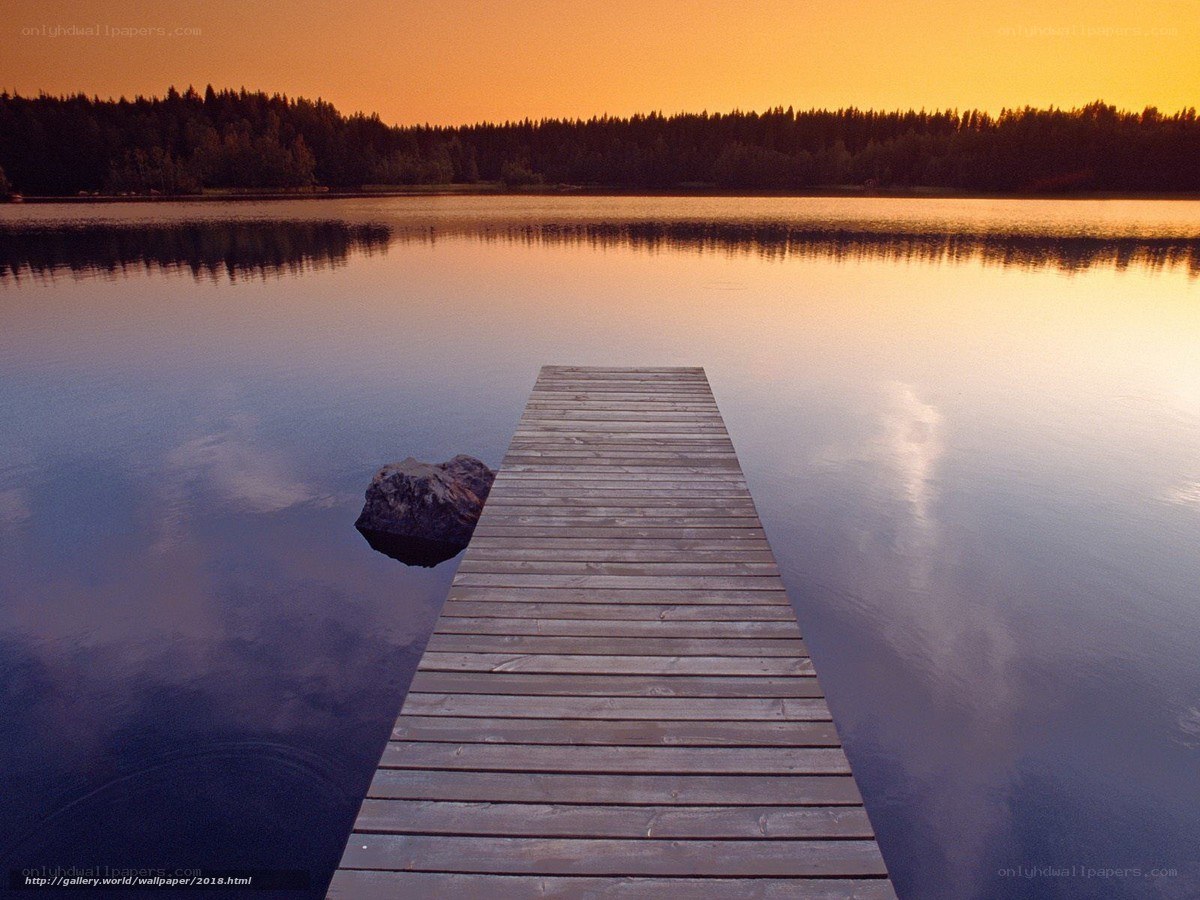 Wooden dock at sunset