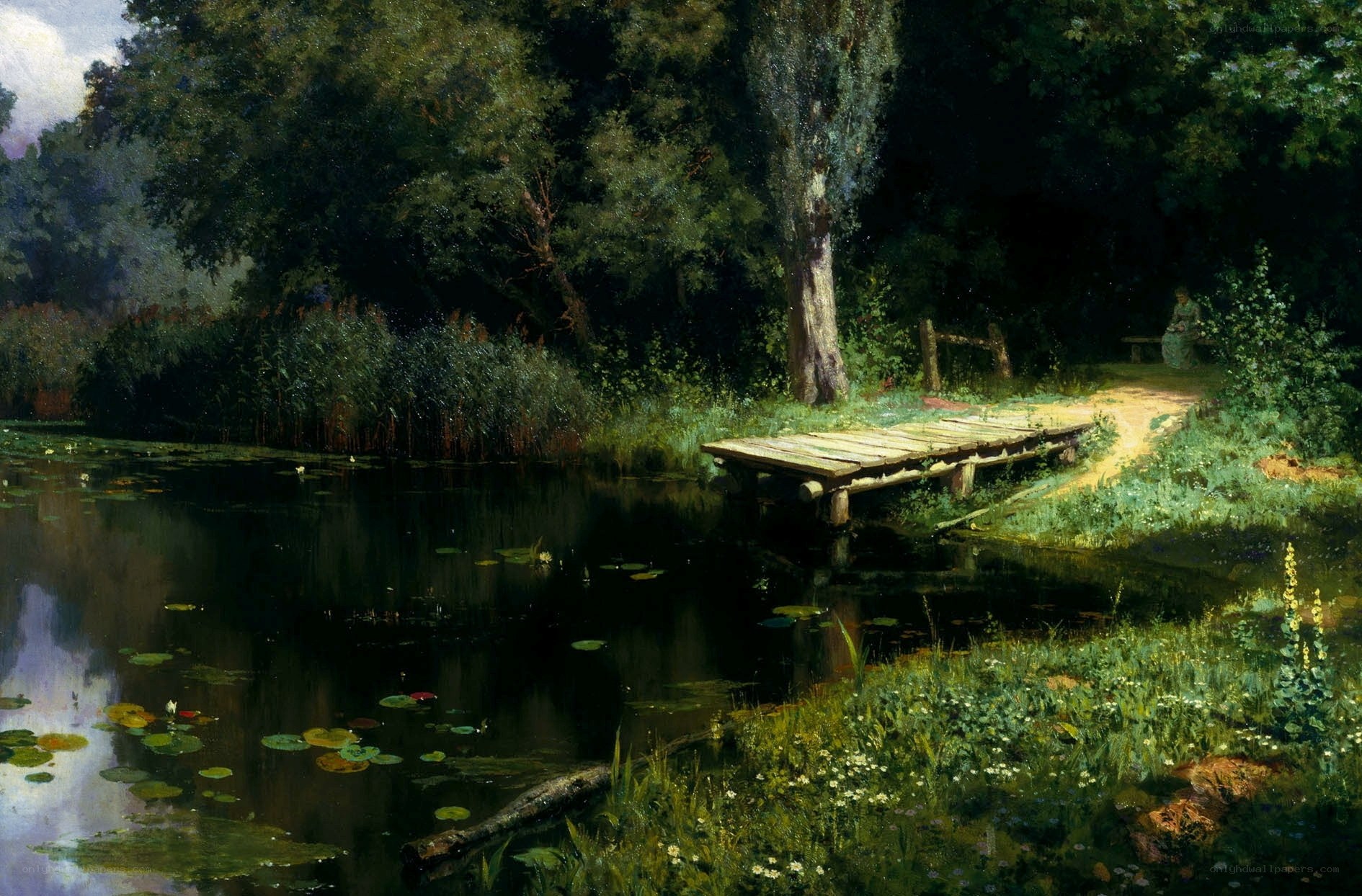 Wooden dock by a pond