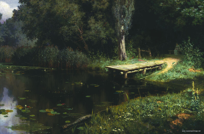 Wooden dock by a pond