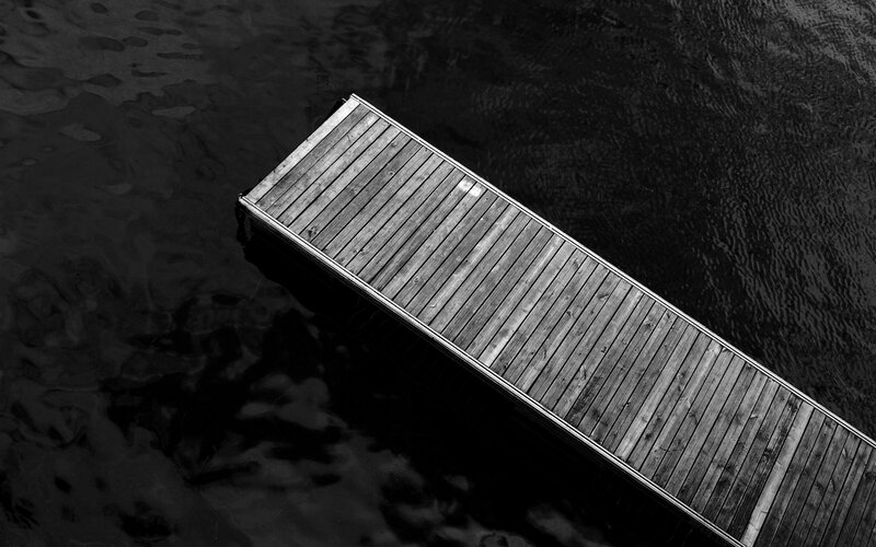 Wooden dock extending into water