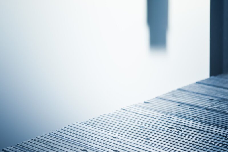 wooden dock in mist