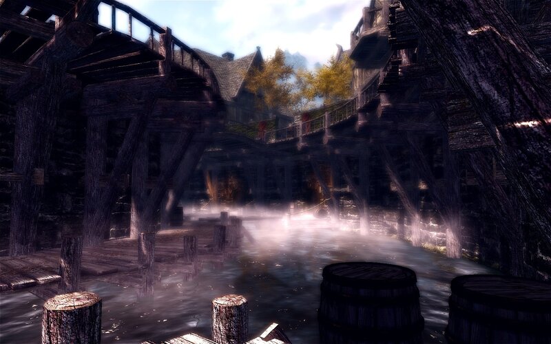 wooden dock in misty village