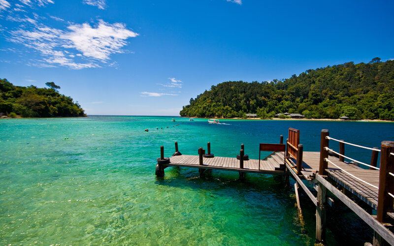 Wooden Dock in Turquoise Water — Blue