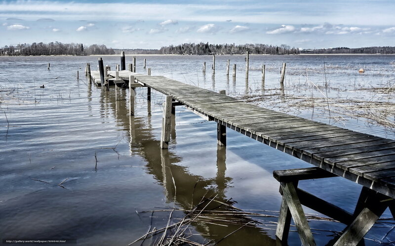Wooden dock on a calm lake