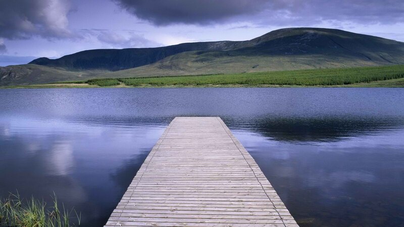 Wooden dock on a calm lake
