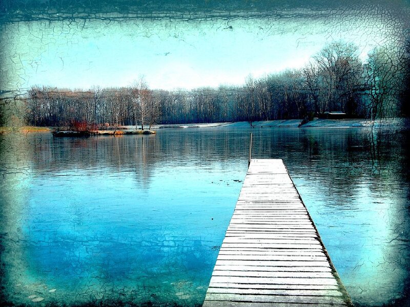 Wooden dock on a calm lake