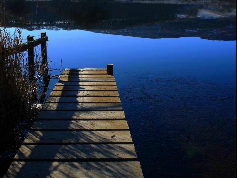 Wooden dock on a calm lake