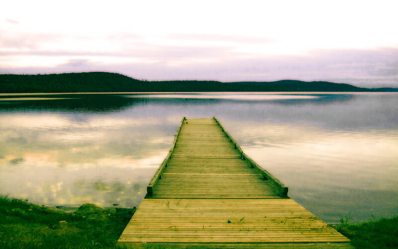 Wooden dock on a calm lake