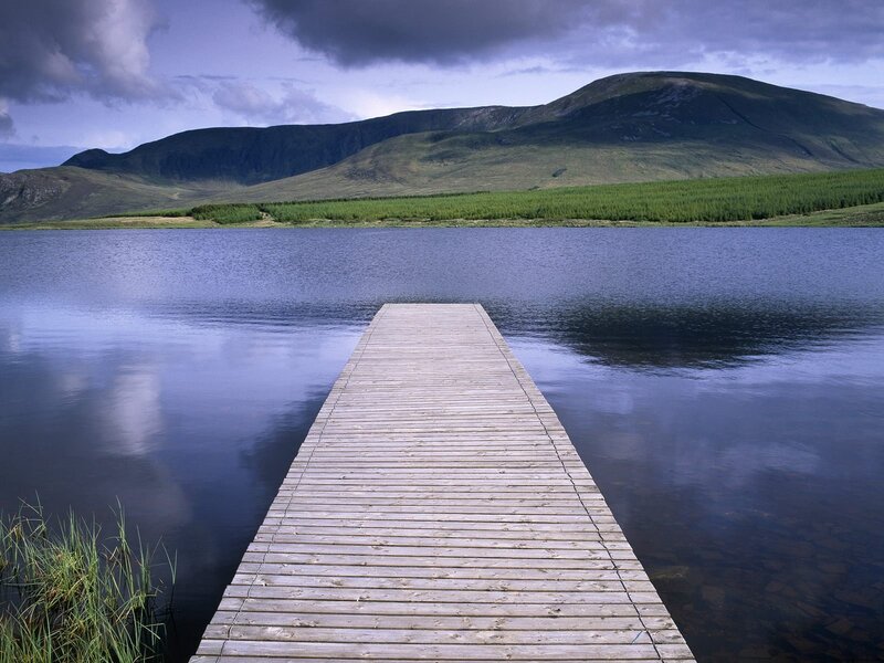 Wooden dock on a calm lake