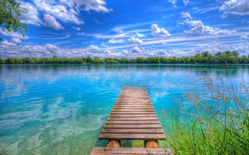 Wooden dock on a clear lake
