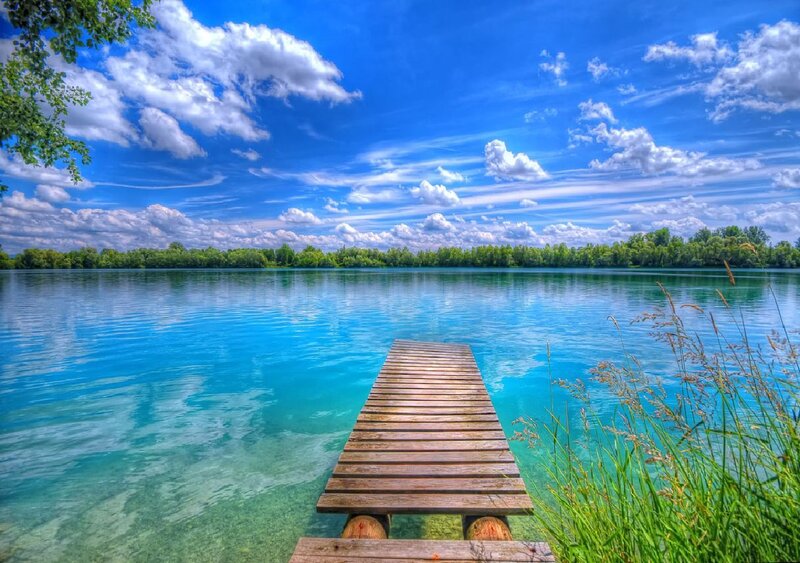 Wooden dock on a clear lake