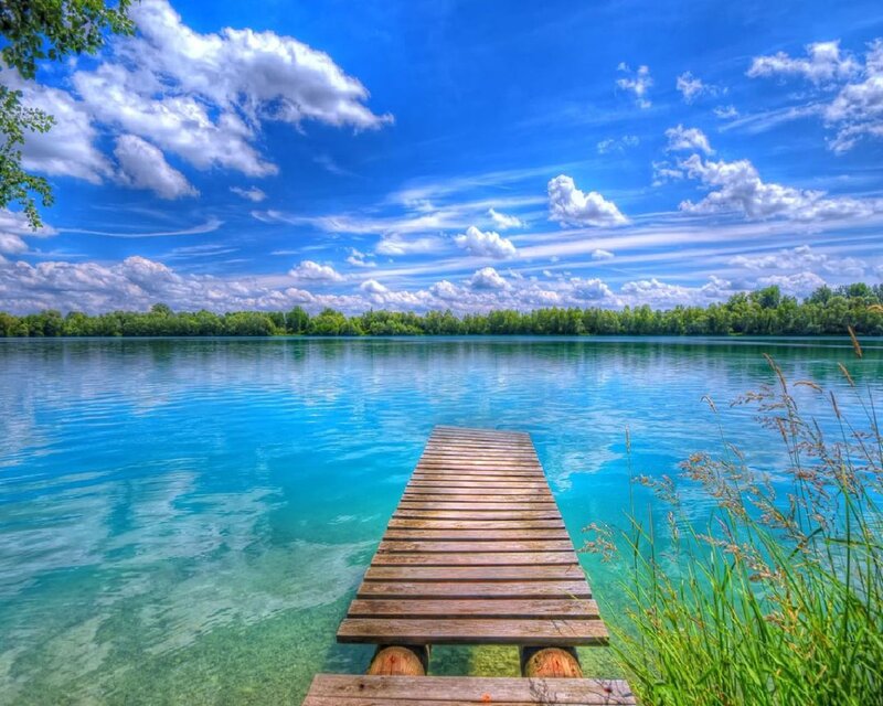 Wooden dock on a clear lake