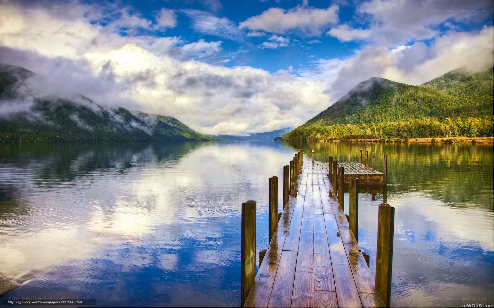 Wooden dock on a misty lake