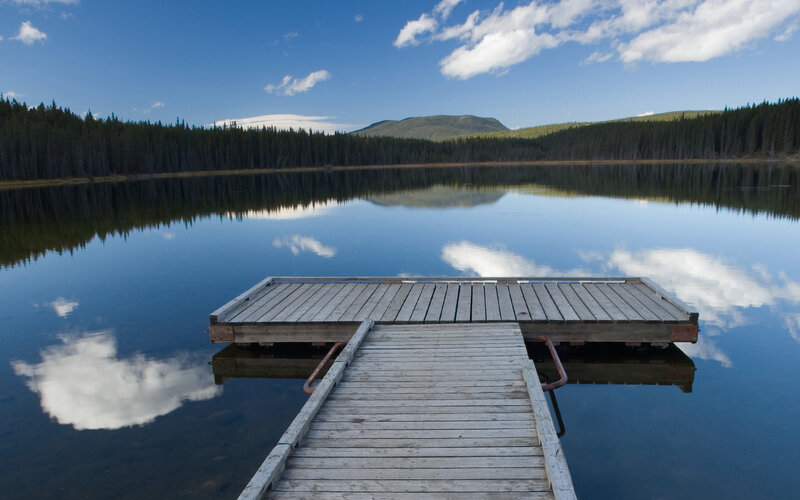 Wooden dock on calm lake
