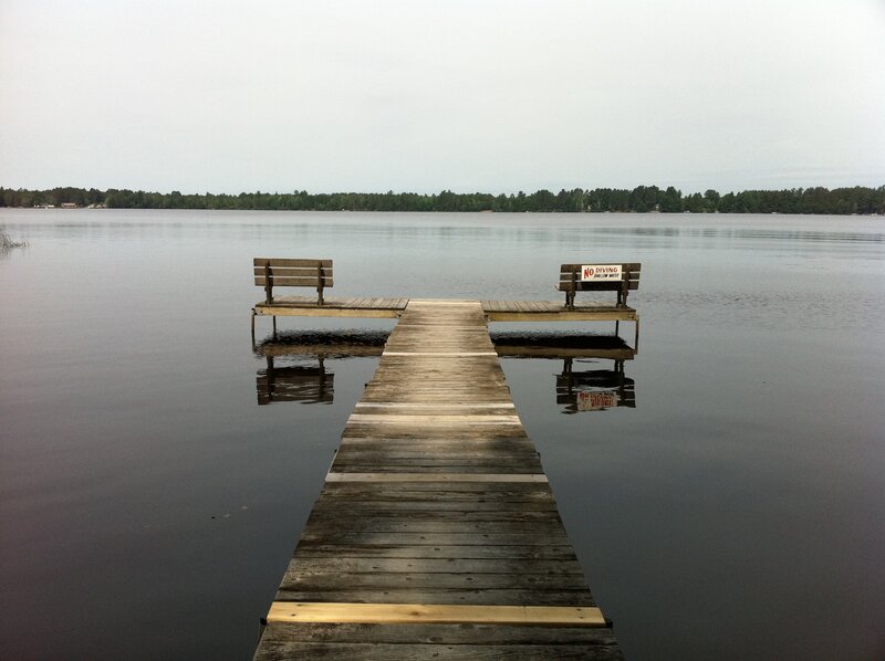 Wooden dock on calm lake