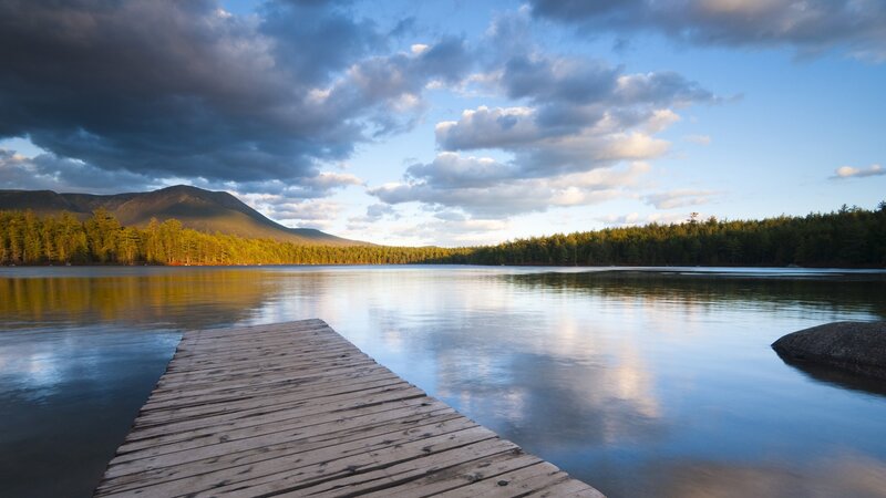 Wooden dock on calm lake