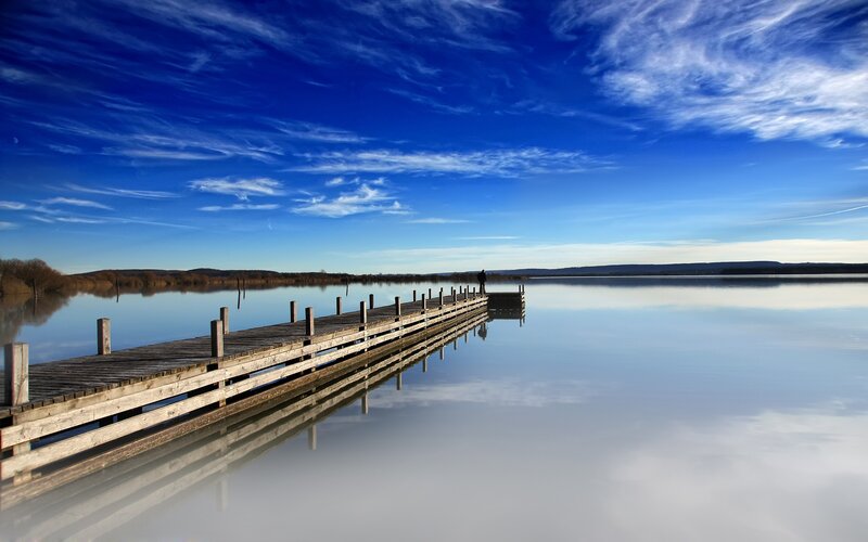 Wooden dock on calm lake