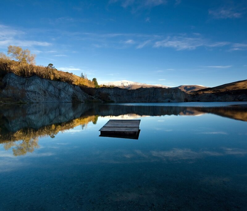 Wooden dock on calm lake