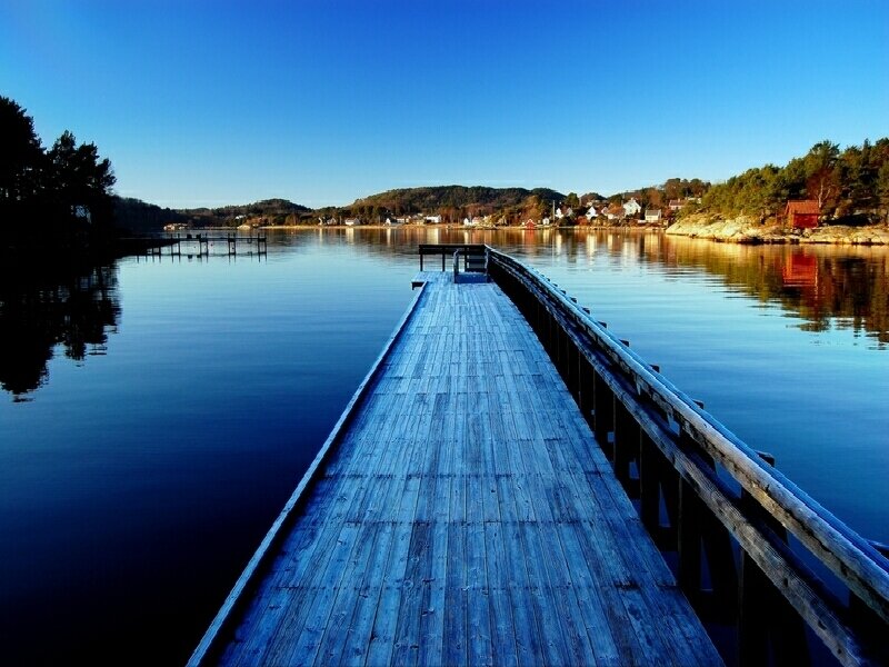 Wooden dock on calm lake