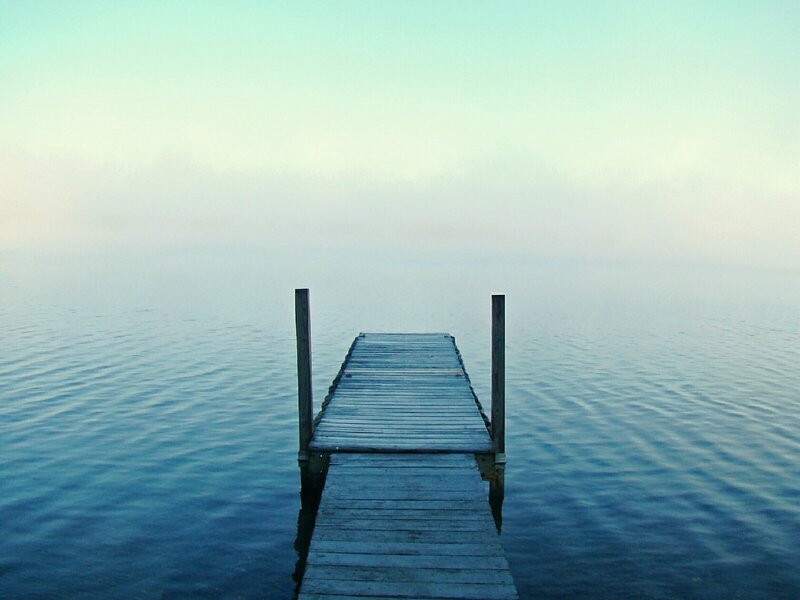 Wooden dock on calm lake