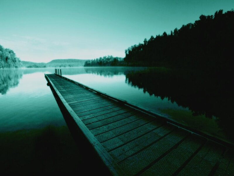 Wooden dock on calm lake
