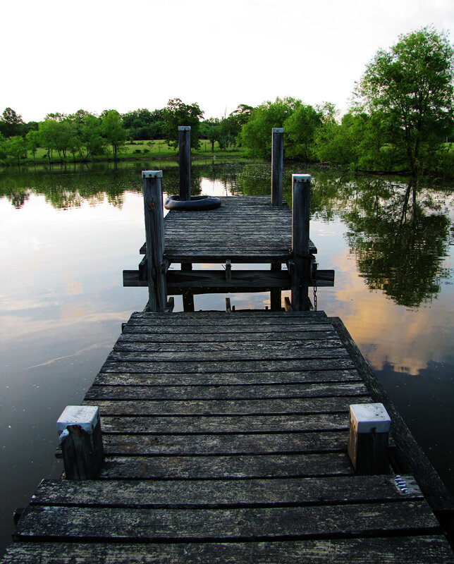 Wooden dock on calm lake