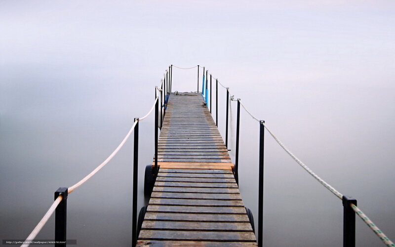 Wooden dock on calm water