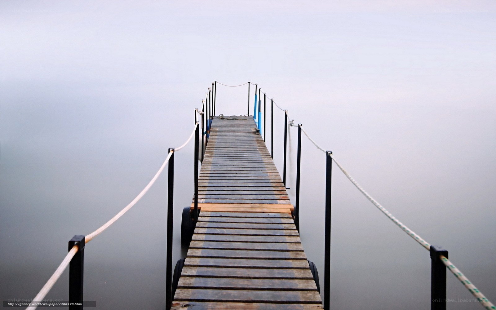 Wooden dock on calm water