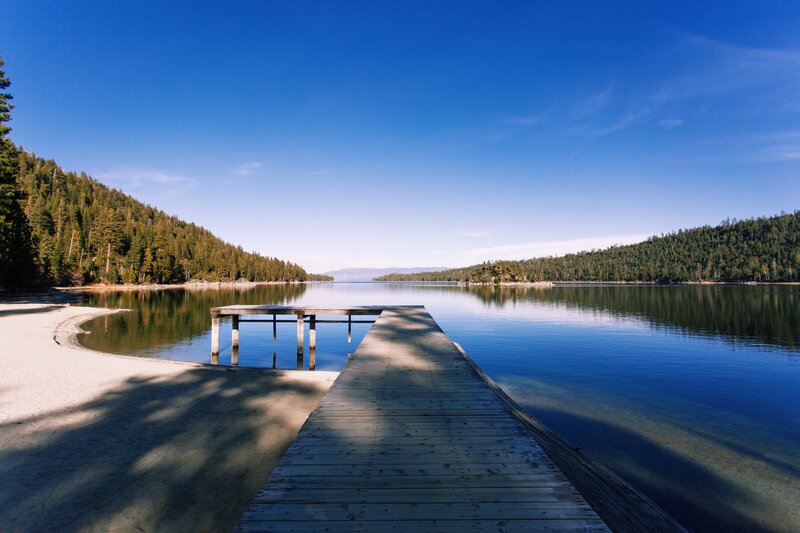 Wooden Dock on Lake — Blue, Serene, Afternoon, Photograph, Forest, Sand