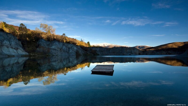 Wooden Dock on Lake — Blue, Serene, Autumn, Photograph, Cliffs