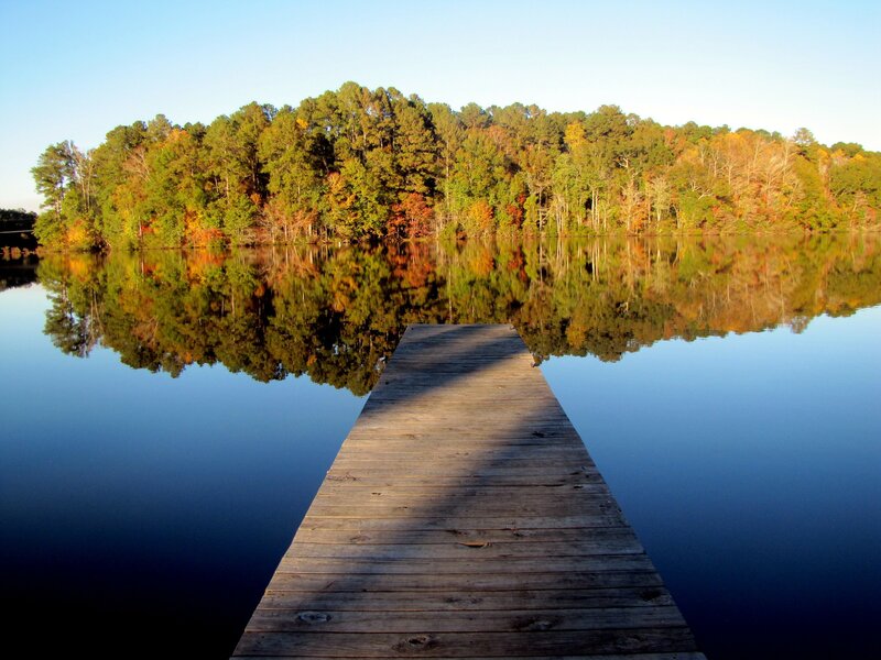 Wooden Dock on Lake — Blue, Serene, Autumn, Photograph, Trees, Reflection