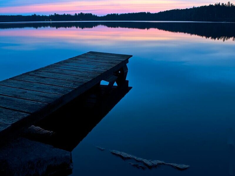 Wooden Dock on Lake — Blue, Serene, Sunset, Photograph, Forest