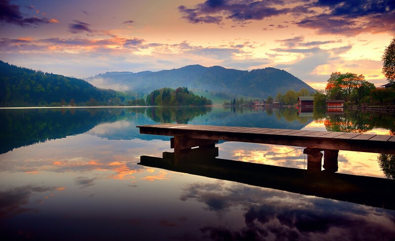 Wooden Dock on Lake — Blue, Serene, Sunset, Photograph, Mountains, Trees