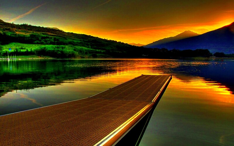 Wooden Dock on Lake — Orange, Serene, Sunset, Photograph, Mountains