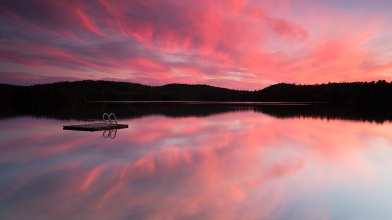 Wooden Dock on Lake — Pink, Serene, Sunset, Photograph, Trees, Sky, Purple