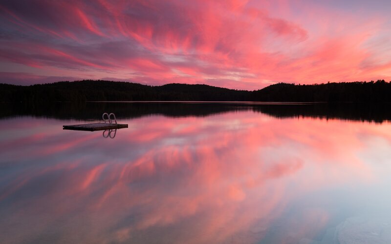 Wooden Dock on Lake — Pink, Serene, Sunset, Photograph, Trees, Sky