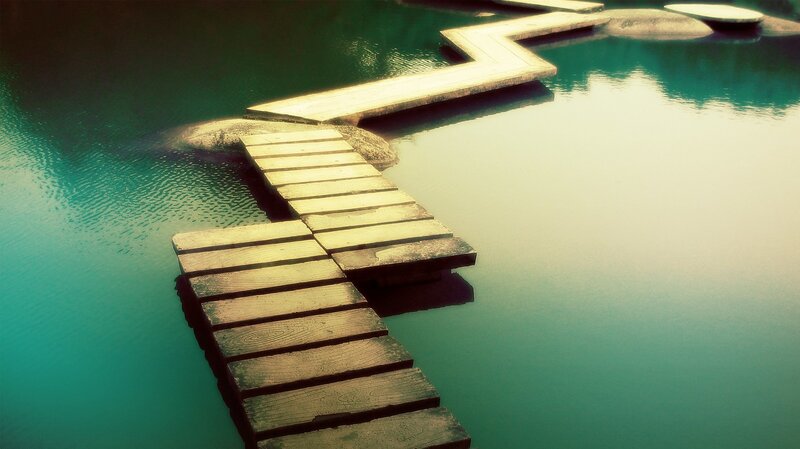 Wooden dock over calm water