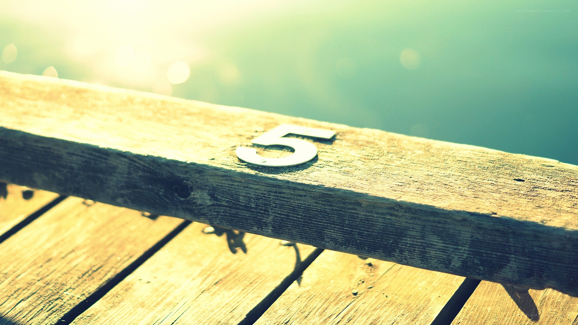 Wooden dock with number five