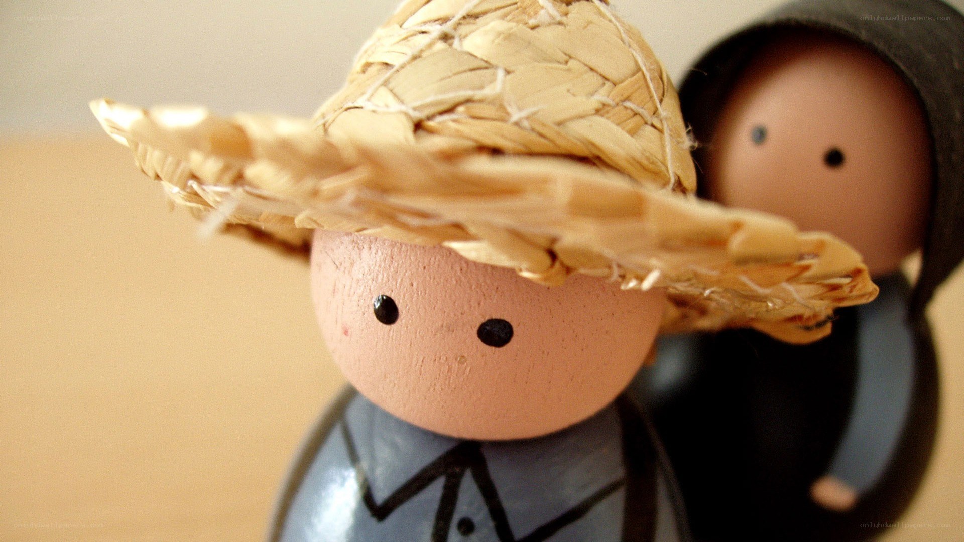 wooden dolls with straw hat