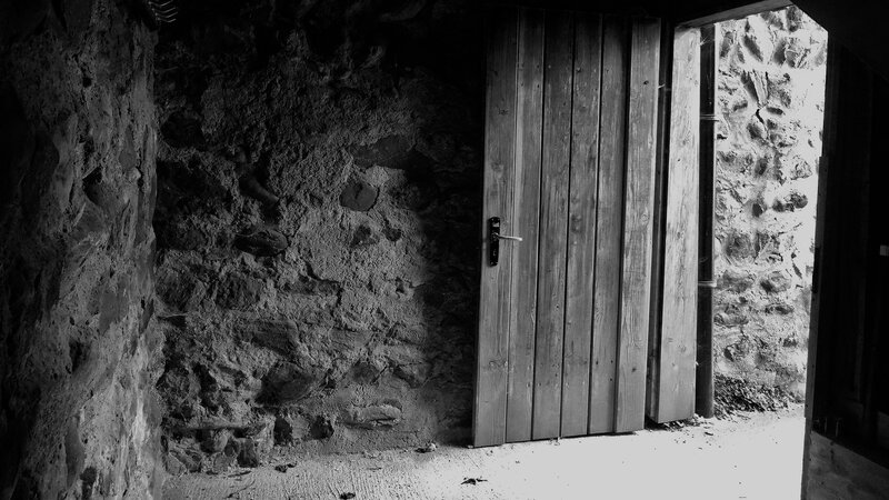 Wooden Door in Stone Wall — Black