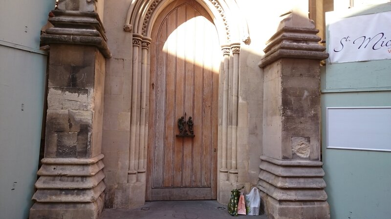 Wooden Door with Stone Pillars