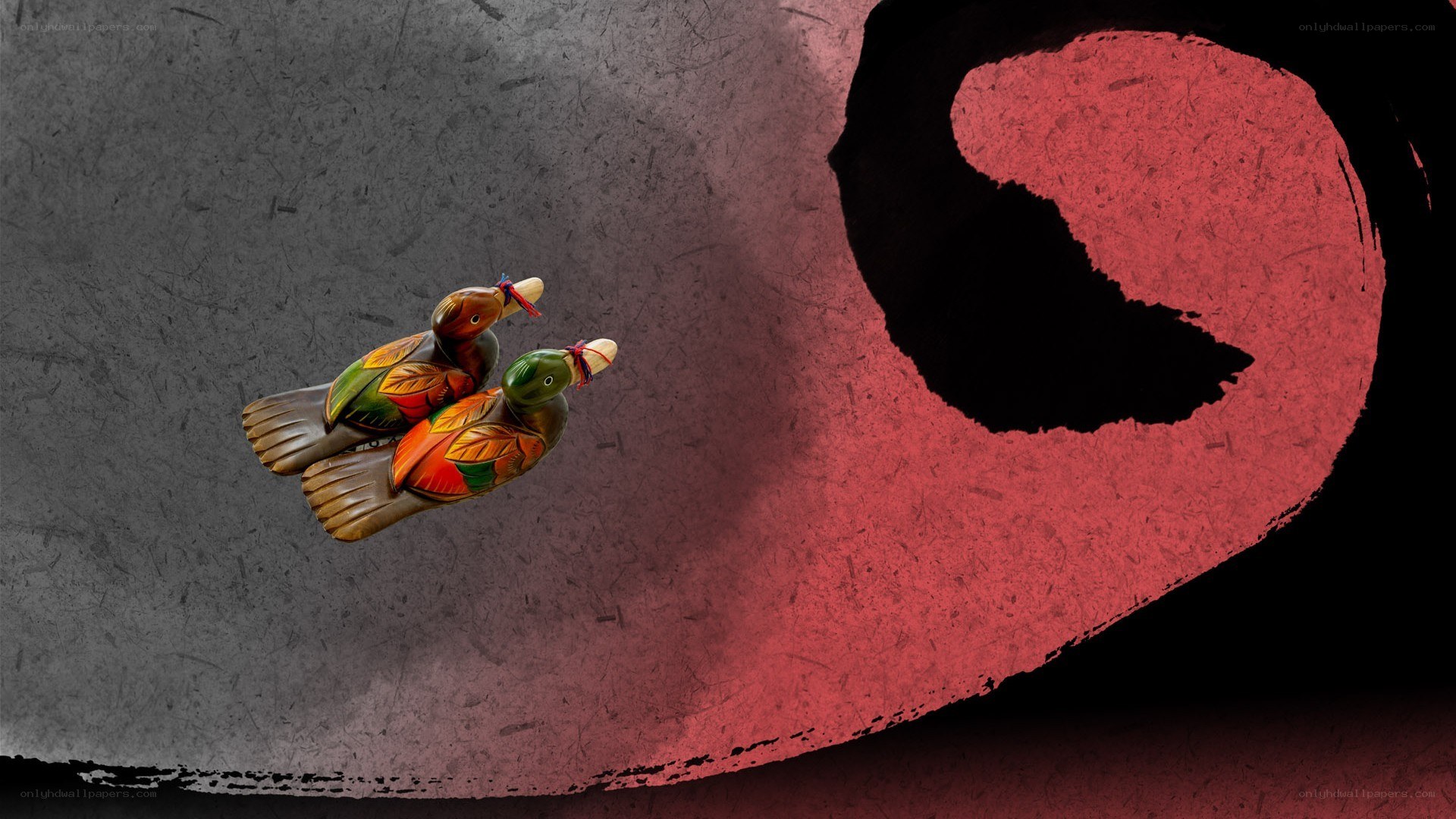 wooden ducks on textured background