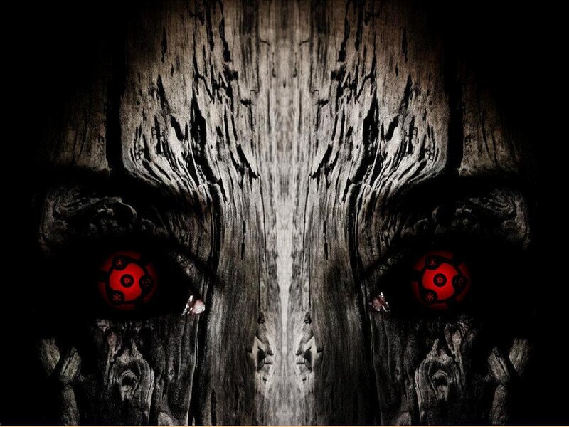 wooden face with red eyes